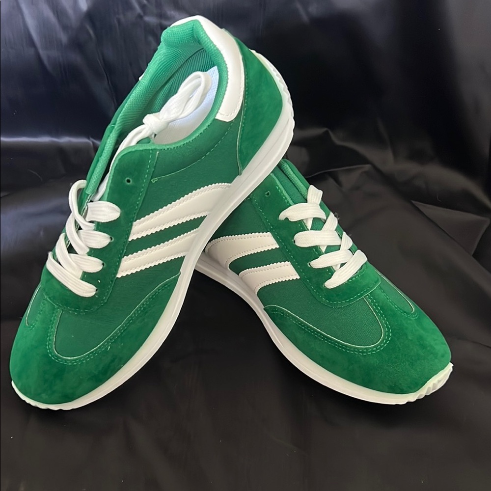 Green and White Athletic Shoes with Retro Design